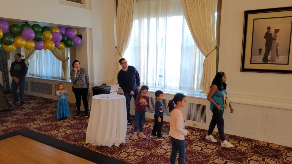 A family walking towards the events