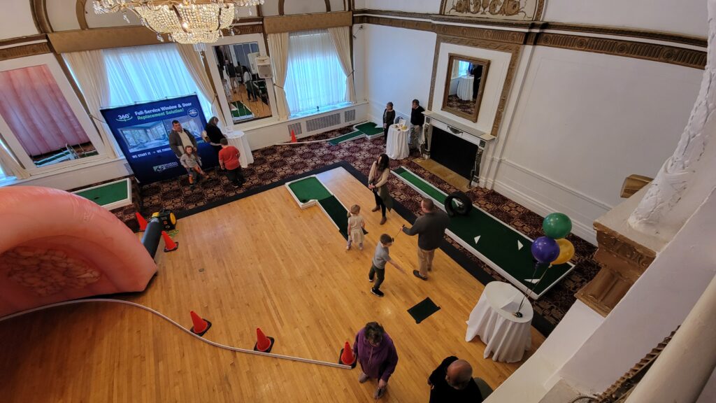 A family golfing together