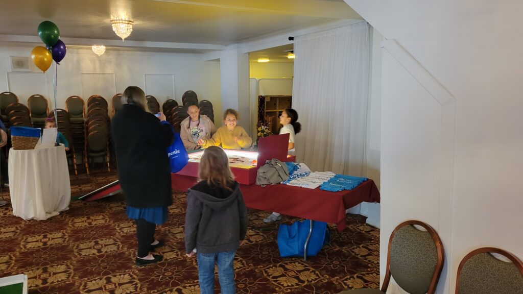 Children playing a large game of operation